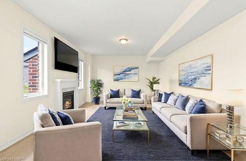 34 Oriole Crescent, Port Colborne, ON - Indoor Photo Showing Living Room With Fireplace