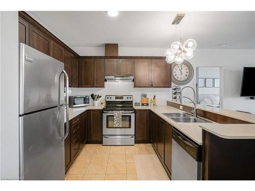 305-26 Wellington Street, St. Catharines, ON - Indoor Photo Showing Kitchen With Stainless Steel Kitchen With Double Sink