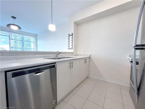 403-10 Concord Place, Grimsby, ON - Indoor Photo Showing Kitchen With Stainless Steel Kitchen With Double Sink