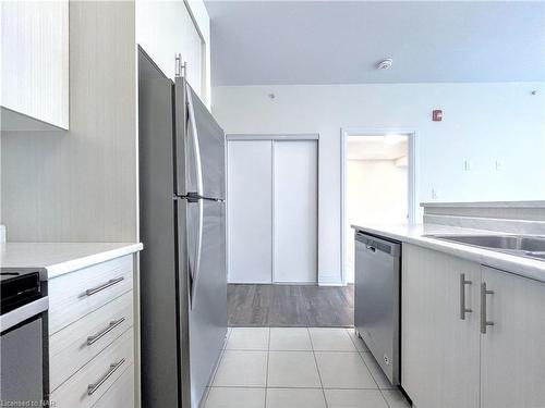 403-10 Concord Place, Grimsby, ON - Indoor Photo Showing Kitchen With Stainless Steel Kitchen