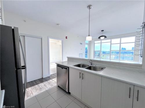 403-10 Concord Place, Grimsby, ON - Indoor Photo Showing Kitchen With Double Sink