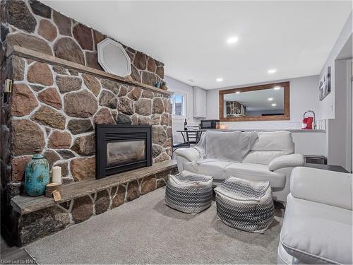 3327 Cattell Drive, Niagara Falls, ON - Indoor Photo Showing Living Room With Fireplace