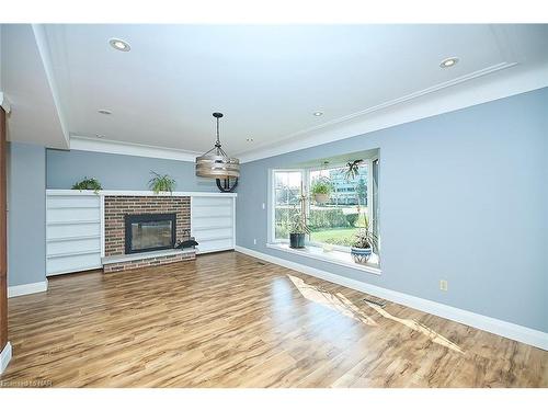 1516 Garrison Road, Fort Erie, ON - Indoor Photo Showing Living Room With Fireplace