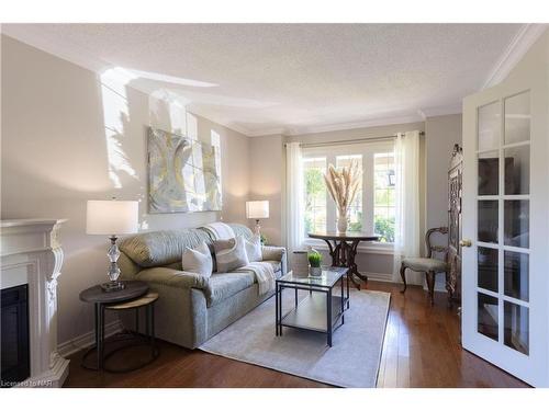 3 Thorn Place, St. Catharines, ON - Indoor Photo Showing Living Room With Fireplace