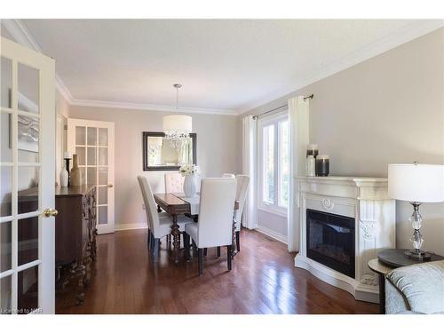 3 Thorn Place, St. Catharines, ON - Indoor Photo Showing Dining Room With Fireplace