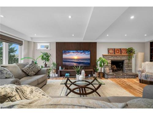 42 October Drive, St. Catharines, ON - Indoor Photo Showing Living Room With Fireplace