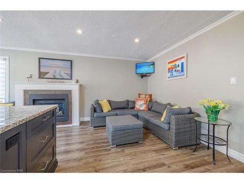 12 1/2 Beachaven Drive, St. Catharines, ON - Indoor Photo Showing Living Room With Fireplace