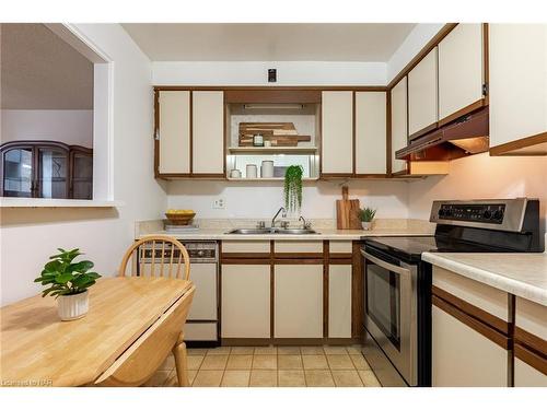 504-141 Church Street, St. Catharines, ON - Indoor Photo Showing Kitchen With Double Sink