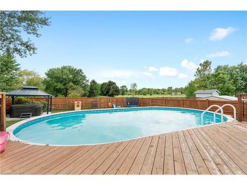 161 Ridge Road S, Crystal Beach, ON - Outdoor With Above Ground Pool With Deck Patio Veranda With Backyard