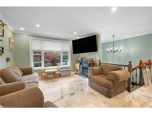 161 Ridge Road S, Crystal Beach, ON - Indoor Photo Showing Living Room With Fireplace