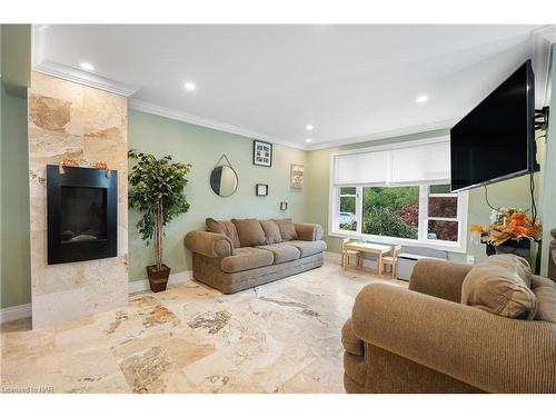 161 Ridge Road S, Crystal Beach, ON - Indoor Photo Showing Living Room With Fireplace