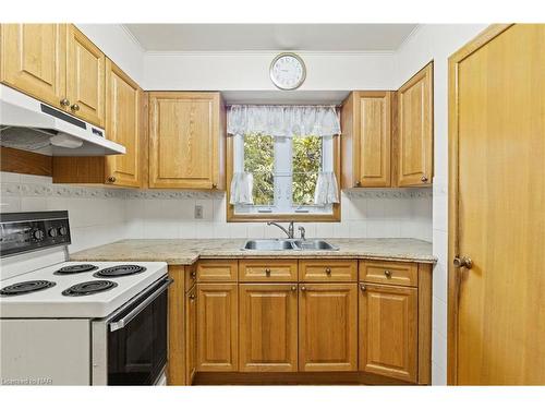 23 Overholt Street, St. Catharines, ON - Indoor Photo Showing Kitchen With Double Sink