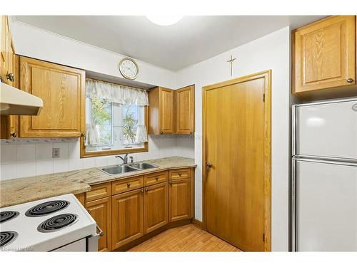 23 Overholt Street, St. Catharines, ON - Indoor Photo Showing Kitchen With Double Sink