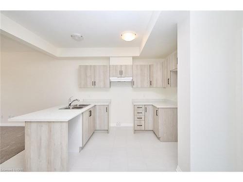 23-397 Garrison Road, Fort Erie, ON - Indoor Photo Showing Kitchen With Double Sink