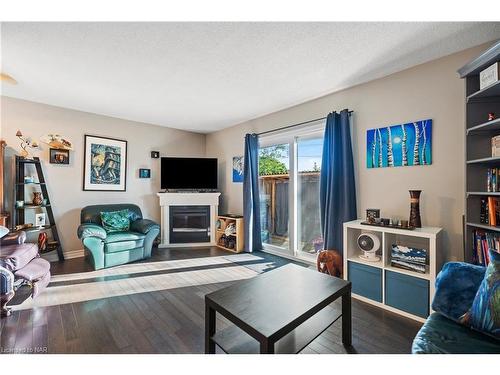 12-65 Dorchester Boulevard, St. Catharines, ON - Indoor Photo Showing Living Room With Fireplace