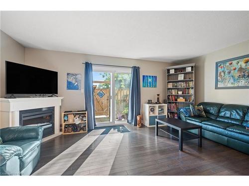 12-65 Dorchester Boulevard, St. Catharines, ON - Indoor Photo Showing Living Room With Fireplace