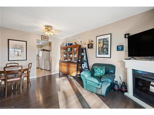 12-65 Dorchester Boulevard, St. Catharines, ON - Indoor Photo Showing Living Room With Fireplace