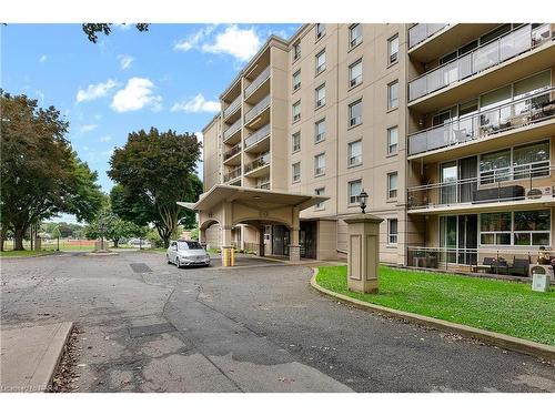 309-6390 Huggins Street, Niagara Falls, ON - Outdoor With Balcony With Facade