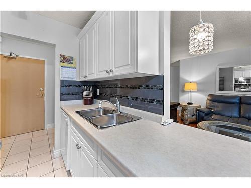 309-6390 Huggins Street, Niagara Falls, ON - Indoor Photo Showing Kitchen With Double Sink