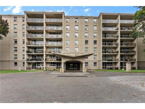 309-6390 Huggins Street, Niagara Falls, ON - Outdoor With Balcony With Facade