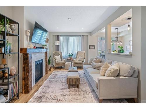 84 Dunrobin Lane, Grimsby, ON - Indoor Photo Showing Living Room With Fireplace