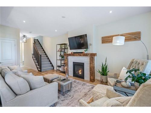 84 Dunrobin Lane, Grimsby, ON - Indoor Photo Showing Living Room With Fireplace