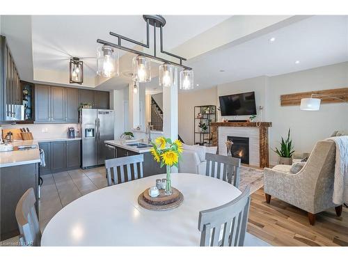 84 Dunrobin Lane, Grimsby, ON - Indoor Photo Showing Dining Room With Fireplace