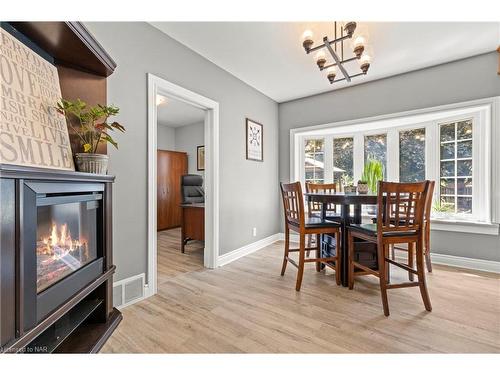 6386 Crawford Street, Niagara Falls, ON - Indoor Photo Showing Dining Room With Fireplace