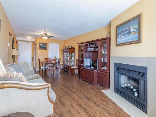 314-78 Roehampton Avenue, St. Catharines, ON - Indoor Photo Showing Living Room With Fireplace