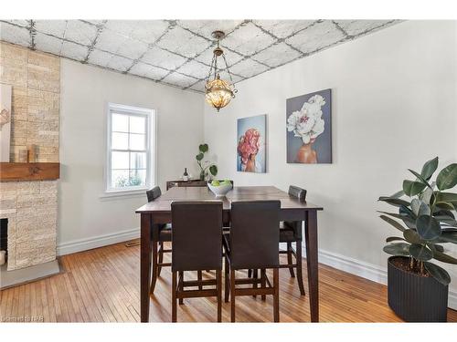 123 Elgin Street W, Welland, ON - Indoor Photo Showing Dining Room With Fireplace