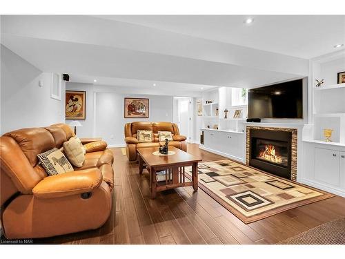 23 Old Oxford Road, St. Catharines, ON - Indoor Photo Showing Living Room With Fireplace