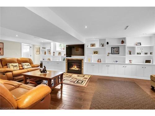 23 Old Oxford Road, St. Catharines, ON - Indoor Photo Showing Living Room With Fireplace