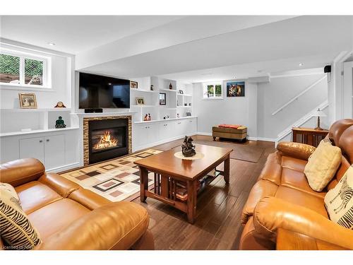 23 Old Oxford Road, St. Catharines, ON - Indoor Photo Showing Living Room With Fireplace