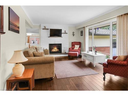 23 Old Oxford Road, St. Catharines, ON - Indoor Photo Showing Living Room With Fireplace