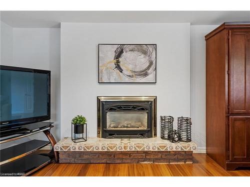 55 Sherwood Forest Trail, Welland, ON - Indoor Photo Showing Living Room With Fireplace