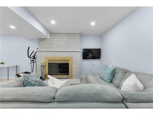 9 Elaine Court, St. Catharines, ON - Indoor Photo Showing Living Room With Fireplace