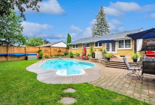 5990 Stevens Street, Niagara Falls, ON - Outdoor With In Ground Pool With Deck Patio Veranda With Backyard