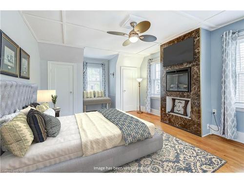 6 Highland Gardens, Welland, ON - Indoor Photo Showing Bedroom With Fireplace