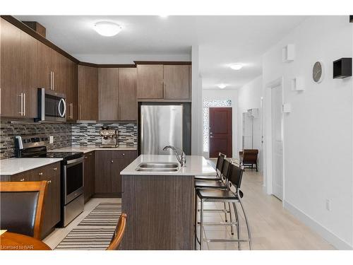 7-1347 Whetherfield Street Street, London, ON - Indoor Photo Showing Kitchen With Stainless Steel Kitchen With Double Sink With Upgraded Kitchen