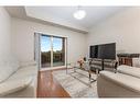 320-8111 Forest Glen Drive, Niagara Falls, ON  - Indoor Photo Showing Living Room 