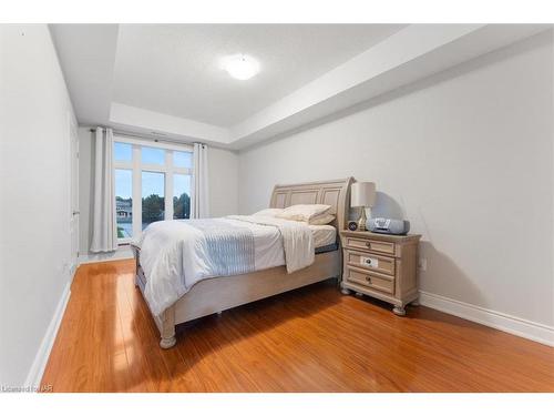 320-8111 Forest Glen Drive, Niagara Falls, ON - Indoor Photo Showing Bedroom