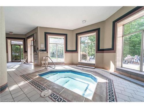 320-8111 Forest Glen Drive, Niagara Falls, ON -  Photo Showing Other Room With In Ground Pool