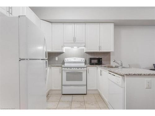 320-8111 Forest Glen Drive, Niagara Falls, ON - Indoor Photo Showing Kitchen