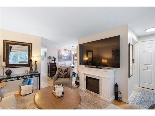 10 Knightwood Drive, St. Catharines, ON - Indoor Photo Showing Living Room With Fireplace