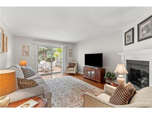 44-15 Lakeside Drive, St. Catharines, ON - Indoor Photo Showing Living Room With Fireplace