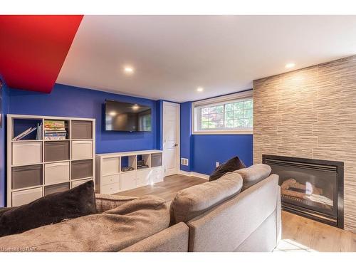 13 Warrington Place, St. Catharines, ON - Indoor Photo Showing Living Room With Fireplace