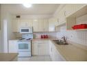 804-35 Towering Heights Boulevard, St. Catharines, ON  - Indoor Photo Showing Kitchen With Double Sink 