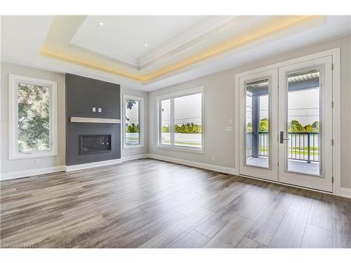 38A Neptune Drive, St. Catharines, ON - Indoor Photo Showing Living Room With Fireplace