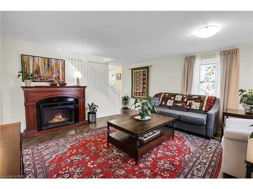 3663 East Main Street, Fort Erie, ON - Indoor Photo Showing Living Room With Fireplace