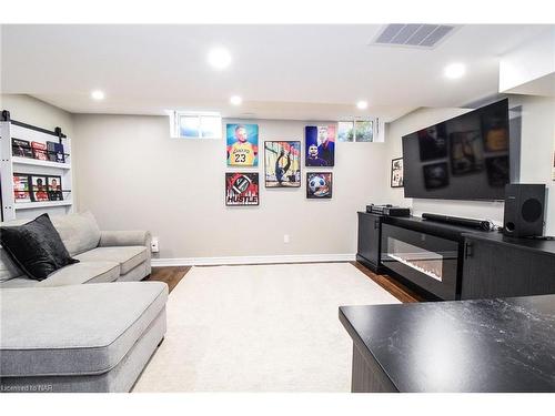 54 Juneberry Road, Thorold, ON - Indoor Photo Showing Basement With Fireplace